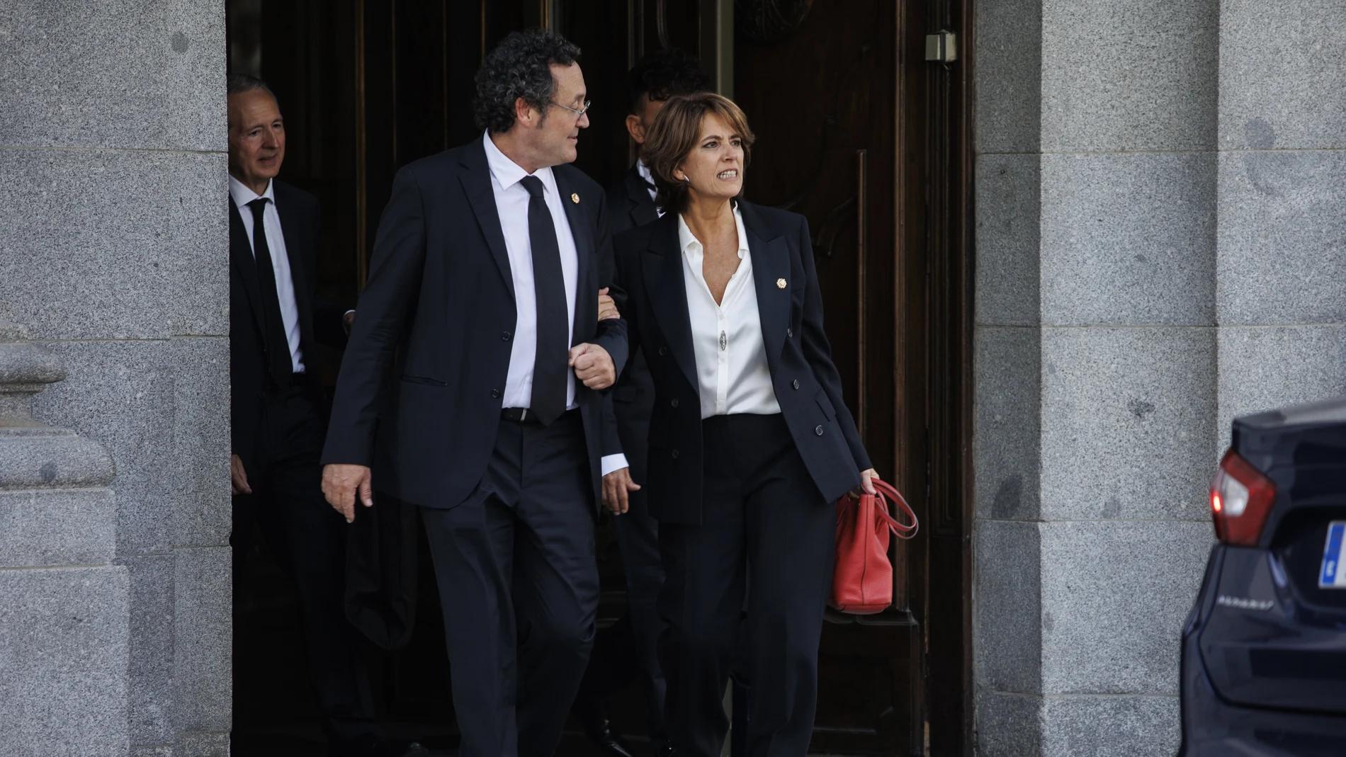 El fiscal General del Estado, Álvaro García Ortiz y la exfiscal general del Estado y nueva fiscal de Sala de la Fiscalía Togada del Tribunal Supremo, Dolores Delgado, a su salida del acto de juramento o promesa de Fiscales de Sala del Tribunal Supremo, en la sede del Tribunal Supremo.