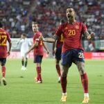Spain's Joselu celebrates after scoring his side's second goal during the Nations League semifinal soccer match between the Spain and Italy at De Grolsch Veste stadium in Enschede, eastern Netherlands, 