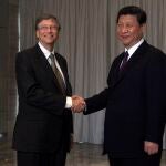 China's President Xi Jinping (R) shakes hands with Microsoft founder Bill Gates before their meeting during the annual Boao Forum for Asia (BFA) conference in Boao town, Hainan China's President Xi Jinping (R) shakes hands with Microsoft founder Bill Gates before their meeting during the annual Boao Forum for Asia (BFA) conference in Boao town, Hainan