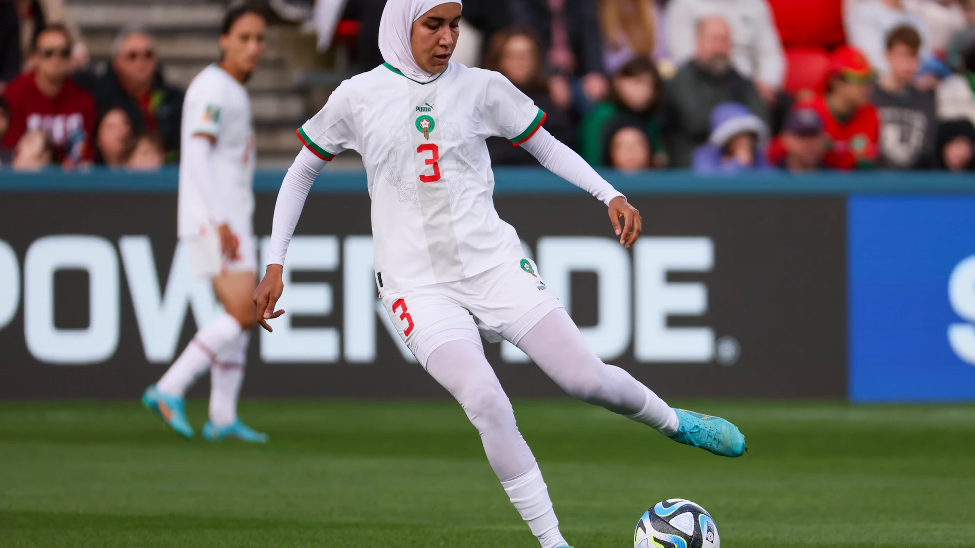 Morocco's Nouhaila Benzina kicks the ball during the Women's World Cup Group H soccer match between South Korea and Morocco in Adelaide, Australia, Sunday, July 30, 2023. (AP Photo/James Elsby)