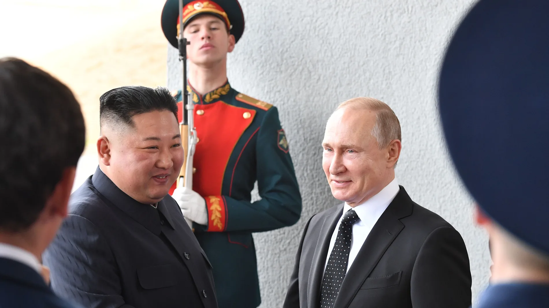 Russian President Vladimir Putin welcomes North Korean leader Kim Jong Un prior to their talks at the Far Eastern Federal University campus on Russky island in the far-eastern Russian port of Vladivostok on April 25, 2019.