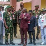 Accra (Ghana), 17/08/2023.- Ghana's Minister of Defence, Dominic Nitiwul (3-R) talks with General Christopher Musa, Chief of Defence Staff of Nigeria (3-L), next to other military leaders during a photo call before the Extraordinary Meeting Of The Economic Community of West African States (ECOWAS) Committee Of Chiefs of The Defence Staff in Accra, Ghana, 17 August 2023. The meeting, excluding Mali, Burkina Faso, Chad, Guinea and Niger, takes place a week after ECOWAS said a 'Äòstandby force'Äô could be used to restore democratically elected President Bazoum of Niger who has been held under house arrest with his wife and son since he was overthrown by the armed junta on 26 July 2023. (República Guinea) EFE/EPA/CHRISTIAN THOMPSON
