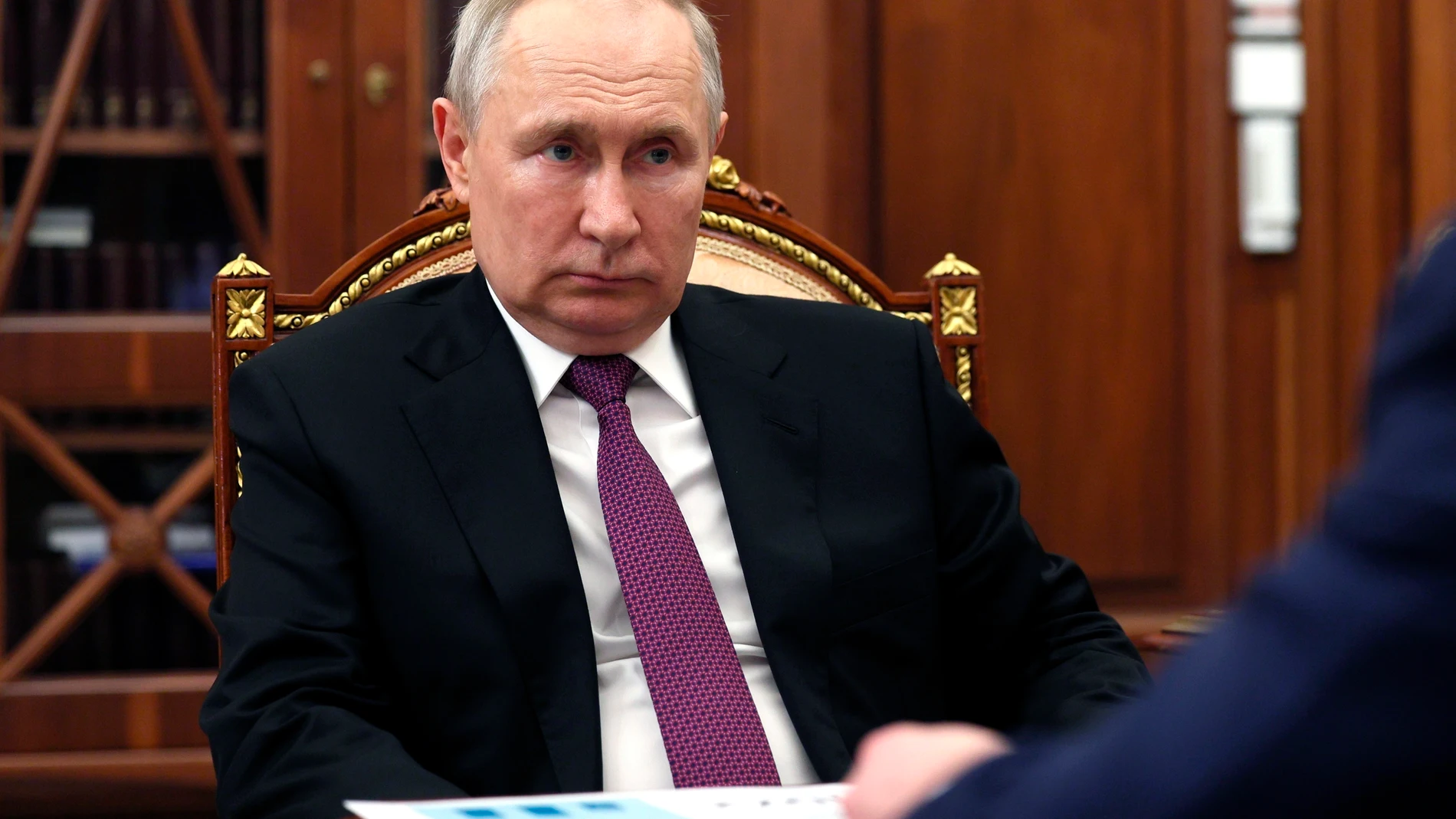 Russian President Vladimir Putin listens to Igor Shuvalov, chairman of the Russian state development corporation VEB.RF during their meeting at the Kremlin in Moscow, Russia, Wednesday, Aug. 30, 2023. (Gavriil Grigorov, Sputnik, Kremlin Pool Photo via AP)