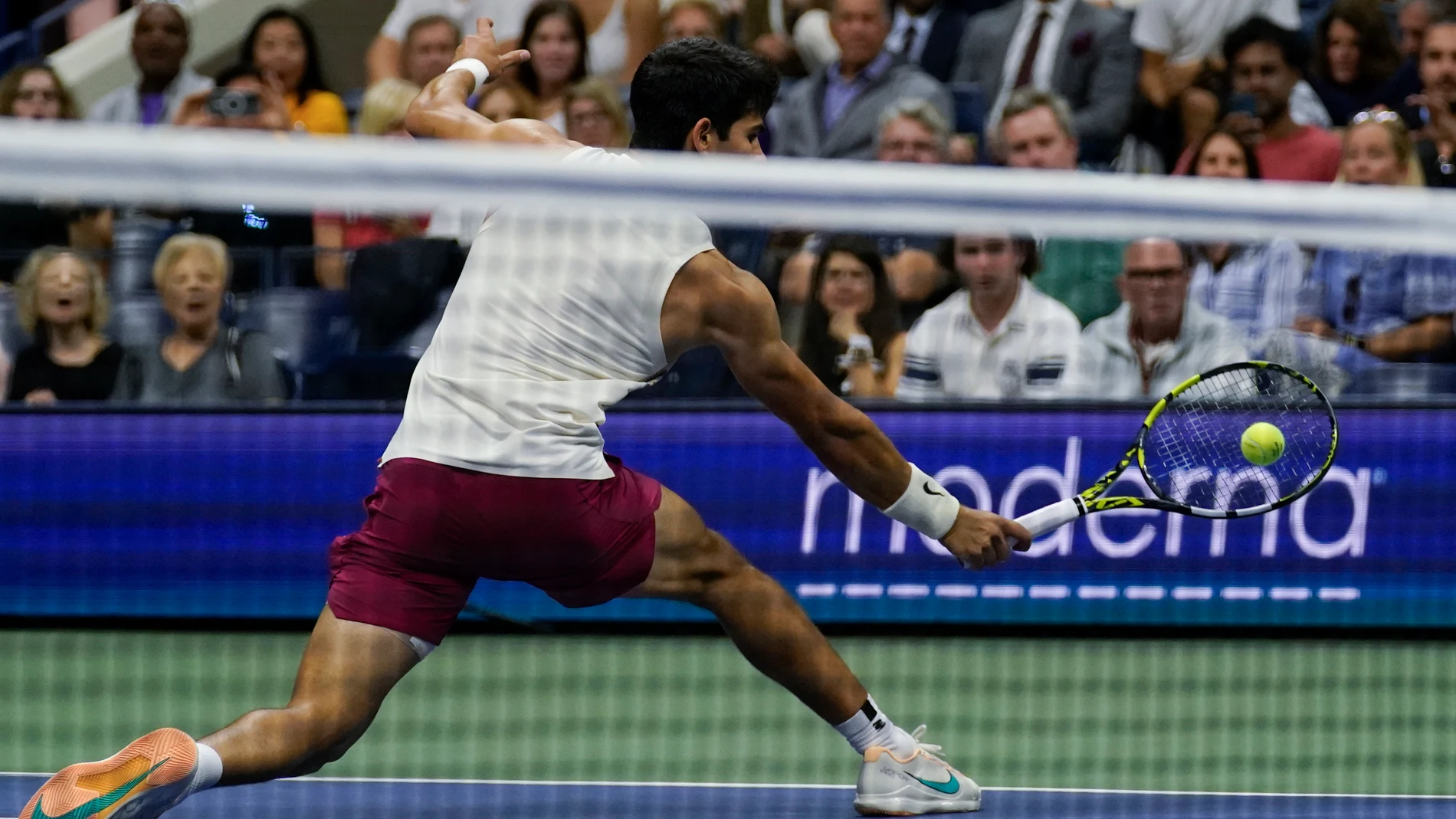Carlos Alcaraz, of Spain, returns a shot to Lloyd Harris, of South Africa, during the second round of the U.S. Open tennis championships, Thursday, Aug. 31, 2023, in New York. (AP Photo/Charles Krupa)