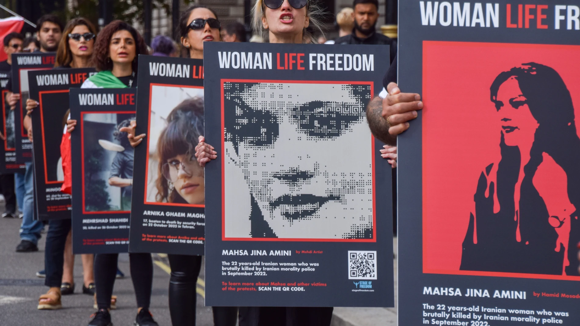 September 13, 2023, London, England, UK: Protesters in Parliament Square. British Iranians staged a protest in Westminster against the Iran regime ahead of the first anniversary of the death of Mahsa Amini and the mass protests and crackdowns in Iran that followed.13/09/2023