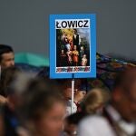 A depiction of the the Ulma family is shown as people attend the service to beatify Jozef and Wiktoria Ulma and their seven children, who were murdered in 1944 by German Nazis for sheltering Jews, in Markowa, where the Ulma family once lived, in southeastern Poland