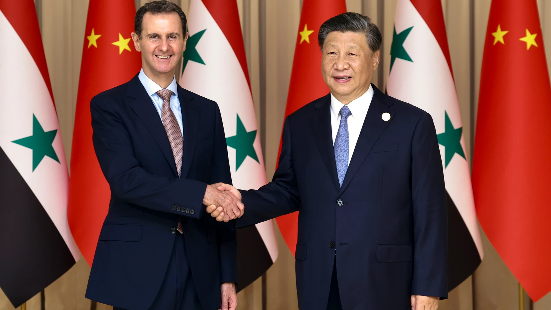 In this photo released by Xinhua News Agency, Chinese President Xi Jinping, right, shakes hands with Syrian President Bashar Assad before their bilateral meeting in Hangzhou, China, Friday, Sept. 22, 2023. China and Syria announced the formation of a strategic partnership on Friday as Chinese leader Xi Jinping kicked off a series of diplomatic meetings ahead of the upcoming Asian Games. (Yao Dawei/Xinhua via AP)