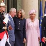 Britain's King Charles III (L), Queen Camilla (2-R), French President Emmanuel Macron (R) and First Lady Brigitte Macron (2-L) pose together at the Elysee Palace in Paris, France, 20 September 2023. The visit, initially planned for March and postponed because of unrests in France, leads the king and queen of Great Britain to Paris and Bordeaux and includes a state dinner, official appointments with President Macron and more informal meetings with French and British citizens