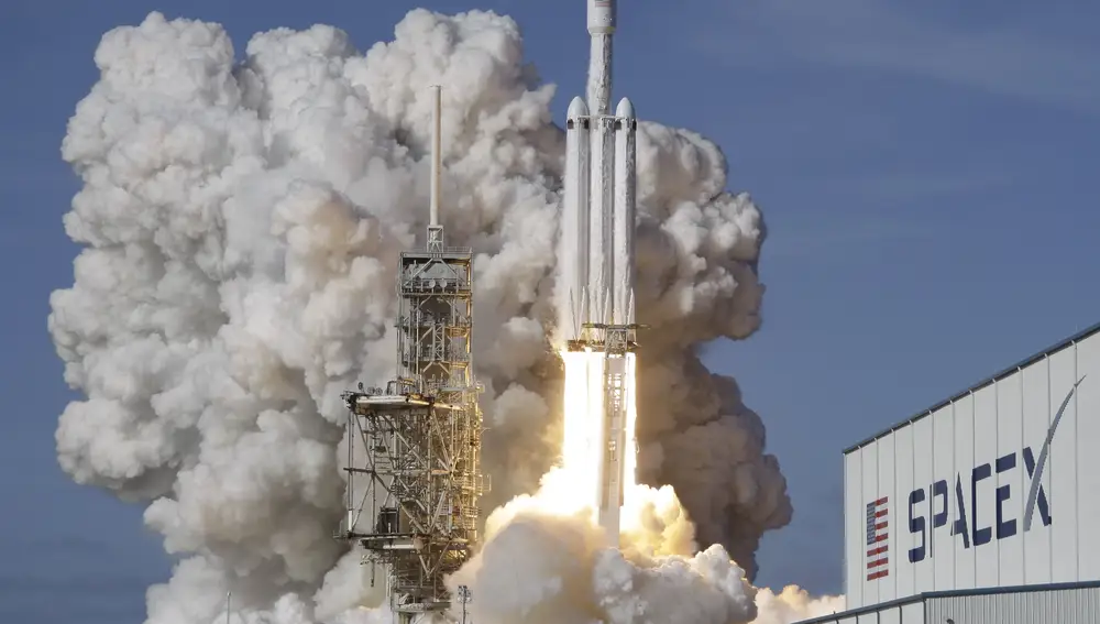 A Falcon 9 SpaceX heavy rocket lifts off from pad 39A at the Kennedy Space Center in Cape Canaveral, Fla.