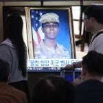 A TV screen shows a file image of American soldier Travis King during a news program at the Seoul Railway Station in Seoul, South Korea, Wednesday, Sept. 27, 2023. North Korea said Wednesday that it will expel King who crossed into the country through the heavily armed border between the Koreas in July. (AP Photo/Ahn Young-joon)