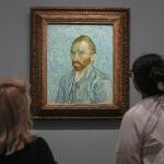 People look at Vincent Van Gogh's oil on canvas painting, Self-portrait, 1889, during the press day of the "Van Gogh in Auvers-sur-Oise: The Final Months" exhibition at the Musee d'Orsay in Paris, Friday, Sept. 29, 2023.