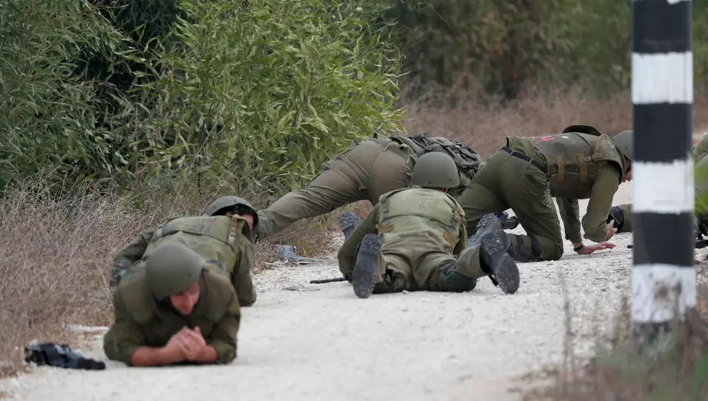 Israeli military tries to strengthen borders with Gaza as battle enters third day