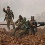 Israeli military tries to strengthen borders with Gaza as battle enters third day