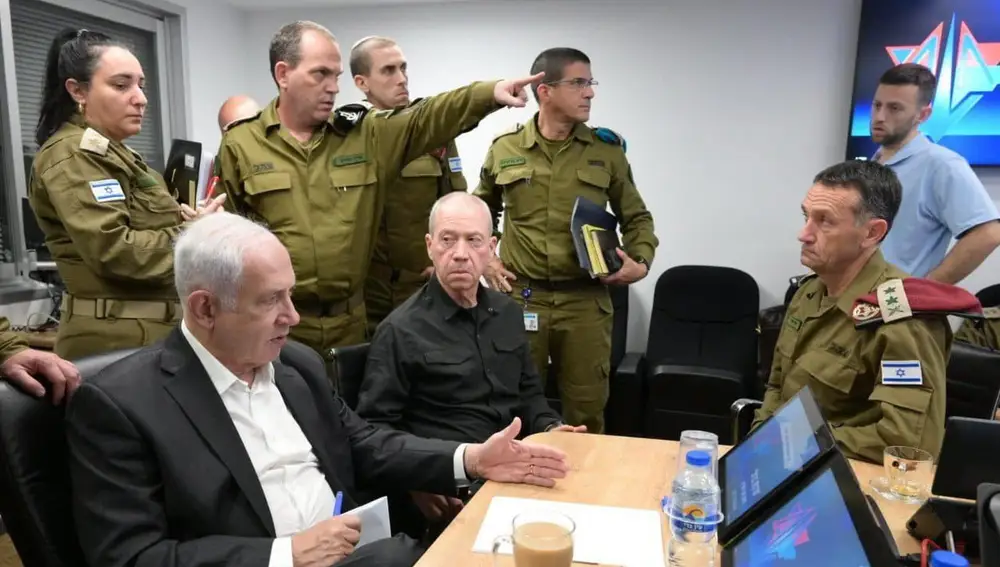 Israeli Prime Minister Benjamin Netanyahu (L) during a situation assessment meeting in Tel Aviv, Israel.