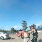 video posted on the Telegram channel "South First Responders" on October 9, 2023, shows an armed Palestinian militant leading a man during the Supernova music festival, near Kibbutz Reim in the Negev desert in southern Israel on October 7.