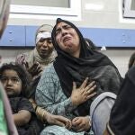 Wounded Palestinians Ahli Arab hospital at the al-Shifa hospital, following Israeli airstrikes, in Gaza City, central Gaza Strip, Tuesday, Oct. 17, 2023.