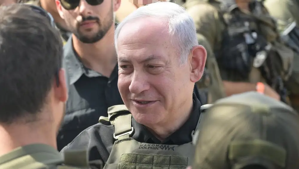Israeli Prime Minister Benjamin Netanyahu meets with soldiers during a visit to the IDF Commando Brigade in northern Israel.