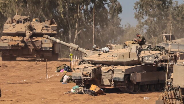 Israeli forces gathered along the border with Gaza