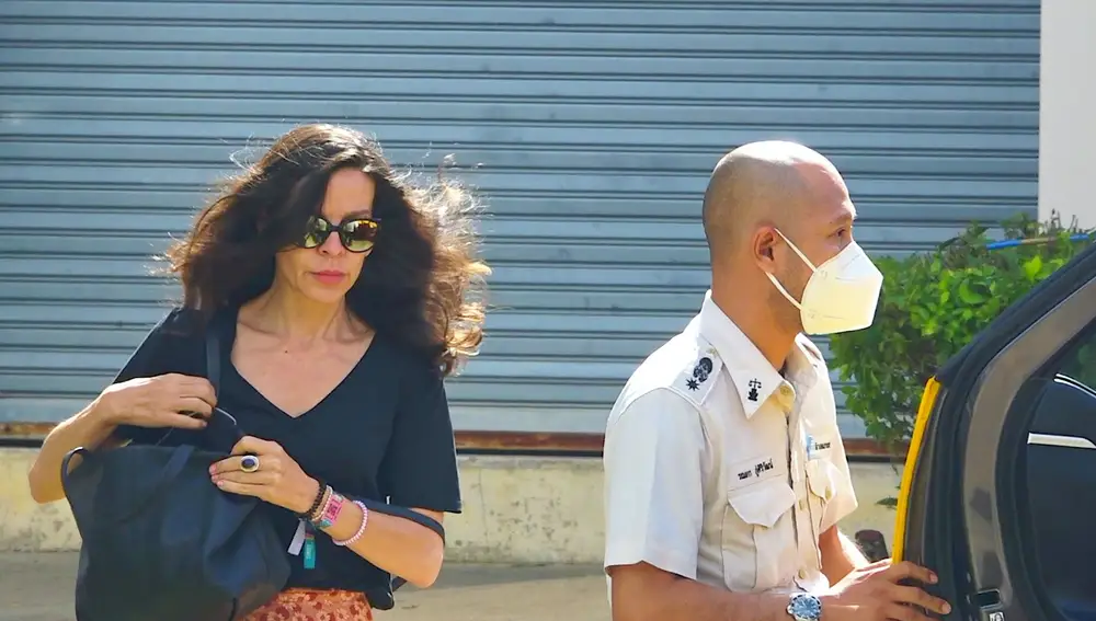 Silvia Bronchalo (L) leaves after visiting her son Daniel Jeronimo Sancho Bronchalo who was charged of murder and dismembering a Colombian surgeon, at a prison in Koh Samui island, southern Thailand
