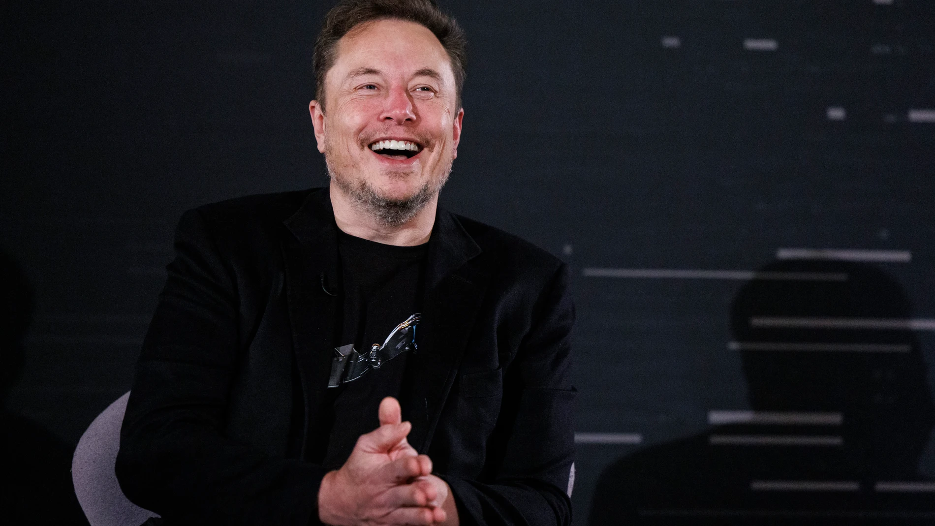 London (United Kingdom), 02/11/2023.- US tech entrepreneur Elon Musk, owner of Tesla, SpaceX and X, reacts as he attends a conversation event with British Prime Minister Rishi Sunak (unseen) in central London, Britain, 02 November 2023. The conversation will be streamed on X (formerly Twitter) and follows the two-day AI Safety Summit that was held at Bletchley Park. (Reino Unido, Londres) EFE/EPA/TOLGA AKMEN / POOL