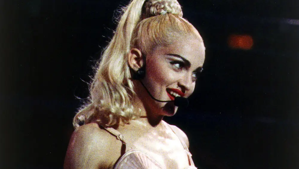 Madonna performs during her "Blonde Ambition" tour, in Philadelphia.