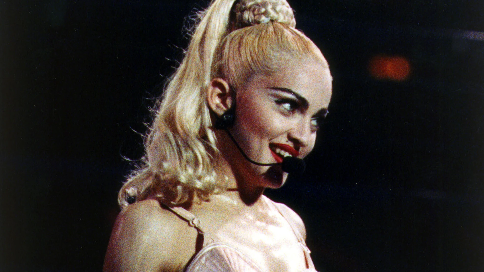 Madonna performs during her "Blonde Ambition" tour, in Philadelphia.