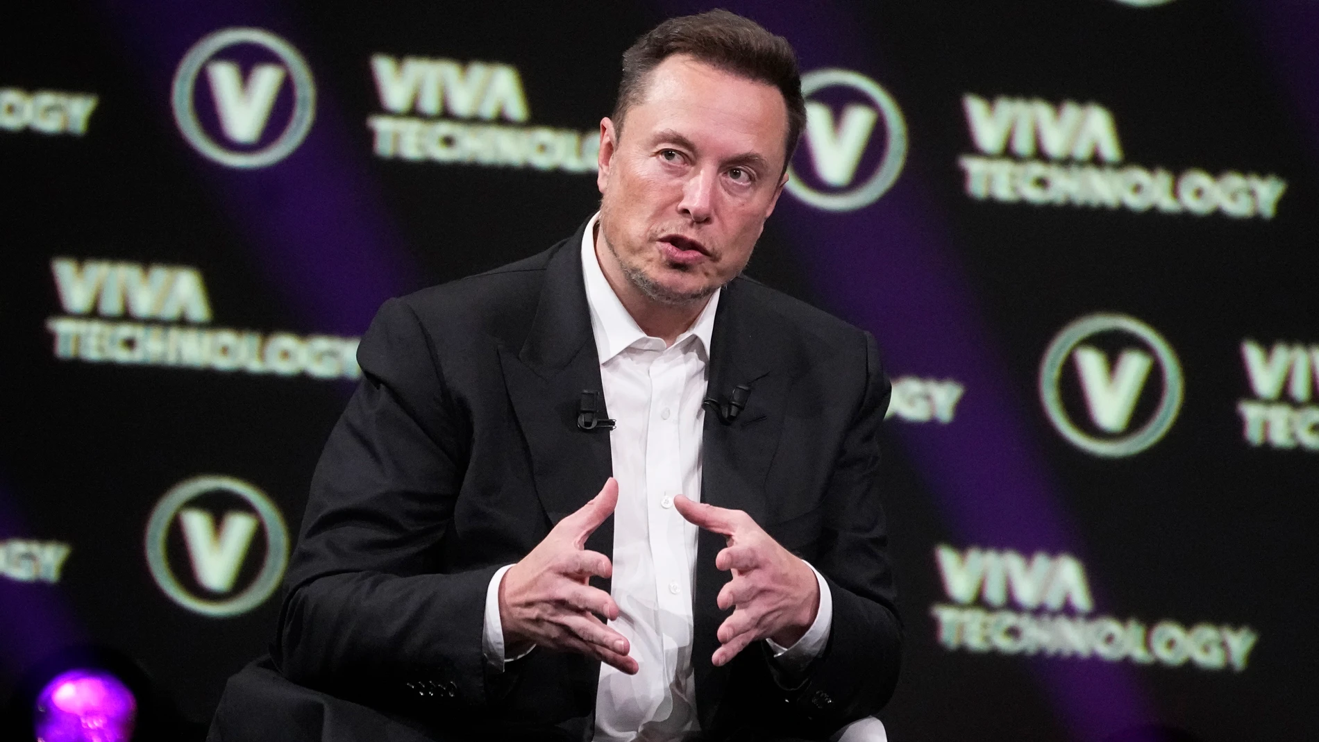 FILE - Elon Musk, who owns X, formerly known as Twitter, Tesla and SpaceX, speaks at the Vivatech fair, June 16, 2023, in Paris. Musk said Wednesday, Nov. 29, that advertisers who have halted spending on his social media platform X in response to antisemitic and other hateful material are engaging in “blackmail” and, using a profanity, essentially told them to go away. (AP Photo/Michel Euler, File)