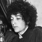Bob Dylan gestures during a press conference in Paris, France.