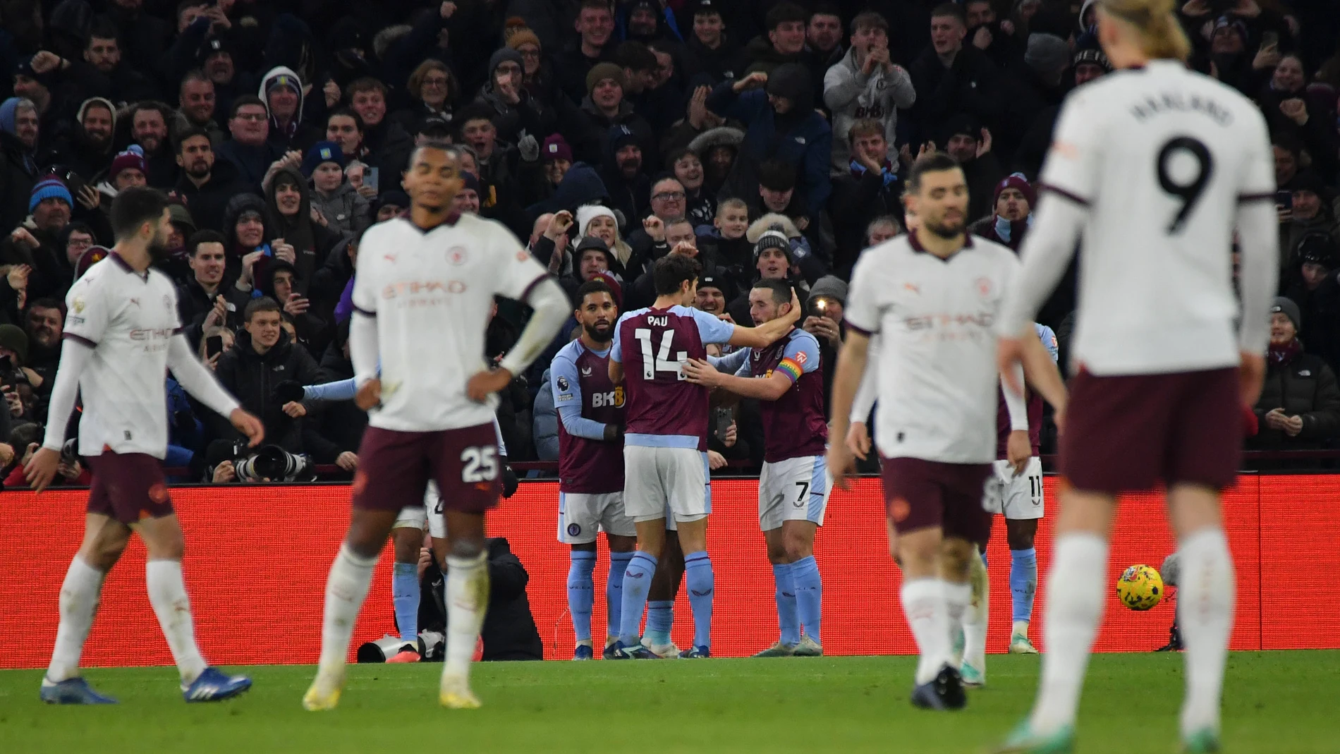 Aston Villa's Leon Bailey celebrates with teammates after scoring during the English Premier League soccer match between Aston Villa and Manchester City at Villa Park in Birmingham, England, Wednesday, Dec. 6, 2023. (AP Photo/Rui Vieira)