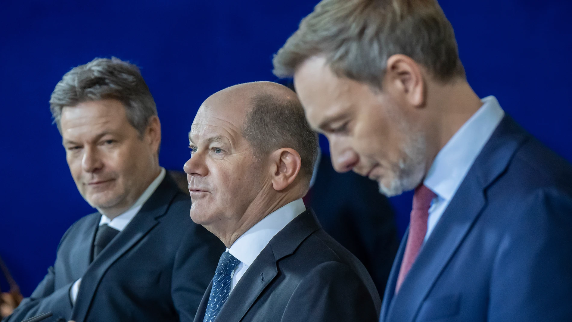 From left, Robert Habeck, Federal Minister for Economic Affairs and Climate Protection, Federal Chancellor Olaf Scholz and Christian Lindner, Federal Minister of Finance, give a press statement on the agreement for the 2024 federal budget in the Federal Chancellery, in Berlin, Wednesday, Dec. 13, 2023. The German government on Wednesday reached a solution to a budget crisis triggered by a court ruling last month, German news agency dpa reported. (Michael Kappeler/dpa via AP)