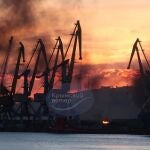 This photograph posted on the Telegram channel @VentdeCrimee on December 26, 2023 shows smoke rising above a damaged warship following a Ukrainian attack in the port of Feodosiya, Russian-controlled Crimea. - The Kremlin on December 26, 2023 acknowledged a Ukrainian attack had damaged a warship in the occupied Crimean port of Feodosia in what Ukraine and its Western allies called a major setback for the Russian navy. (Photo by Handout / Telegram / @VentdeCrimee / AFP) / RESTRICTED TO EDITORIAL USE - MANDATORY CREDIT "AFP PHOTO / TELEGRAM CHANNEL @VENTDECRIMEE" - NO MARKETING NO ADVERTISING CAMPAIGNS - DISTRIBUTED AS A SERVICE TO CLIENTS - RESTRICTED TO EDITORIAL USE - MANDATORY CREDIT "AFP PHOTO / Telegram channel @VentdeCrimee" - NO MARKETING NO ADVERTISING CAMPAIGNS - DISTRIBUTED AS A SERVICE TO CLIENTS / 