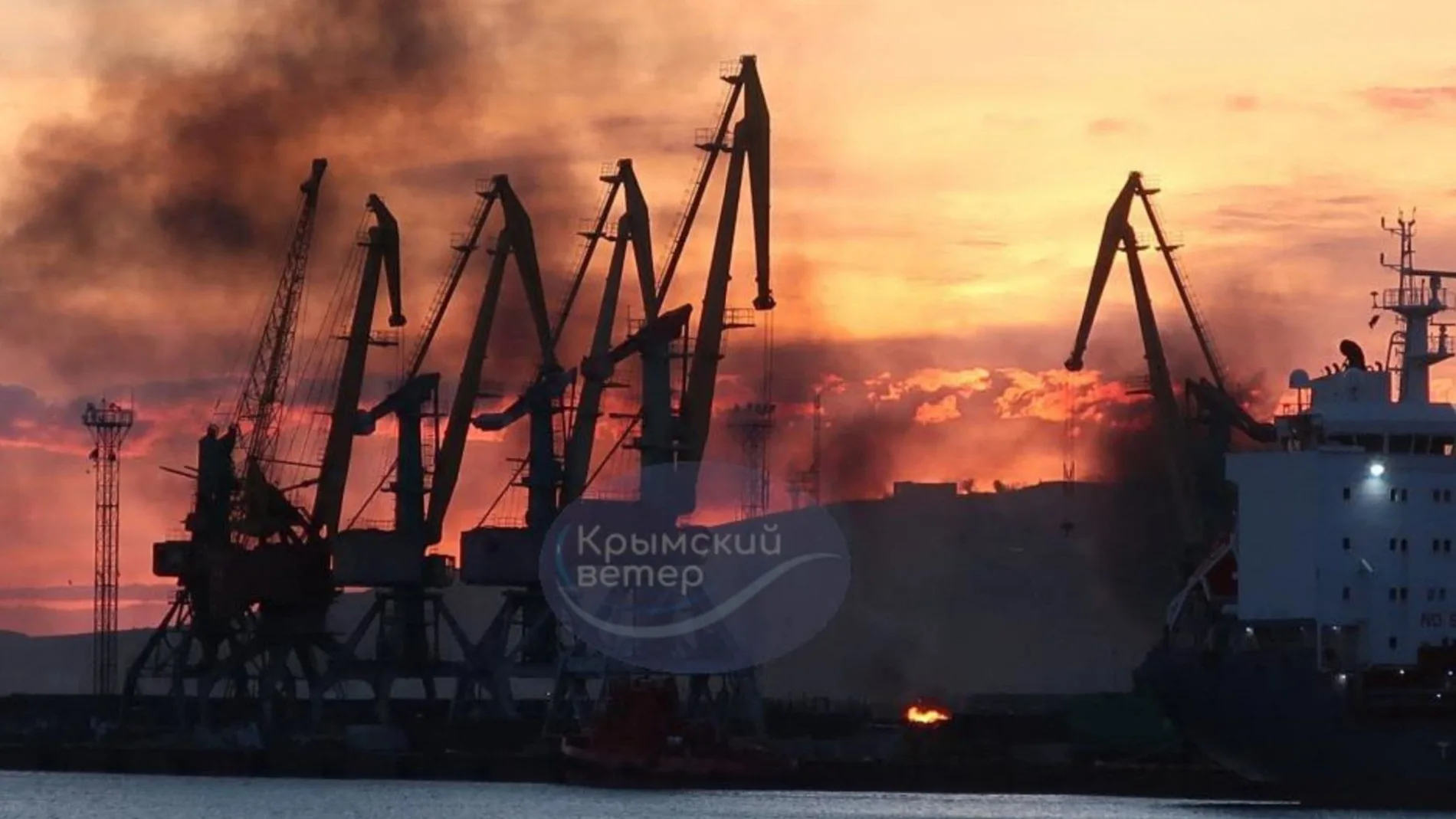 This photograph posted on the Telegram channel @VentdeCrimee on December 26, 2023 shows smoke rising above a damaged warship following a Ukrainian attack in the port of Feodosiya, Russian-controlled Crimea. - The Kremlin on December 26, 2023 acknowledged a Ukrainian attack had damaged a warship in the occupied Crimean port of Feodosia in what Ukraine and its Western allies called a major setback for the Russian navy. (Photo by Handout / Telegram / @VentdeCrimee / AFP) / RESTRICTED TO EDITORIAL USE - MANDATORY CREDIT "AFP PHOTO / TELEGRAM CHANNEL @VENTDECRIMEE" - NO MARKETING NO ADVERTISING CAMPAIGNS - DISTRIBUTED AS A SERVICE TO CLIENTS - RESTRICTED TO EDITORIAL USE - MANDATORY CREDIT "AFP PHOTO / Telegram channel @VentdeCrimee" - NO MARKETING NO ADVERTISING CAMPAIGNS - DISTRIBUTED AS A SERVICE TO CLIENTS /