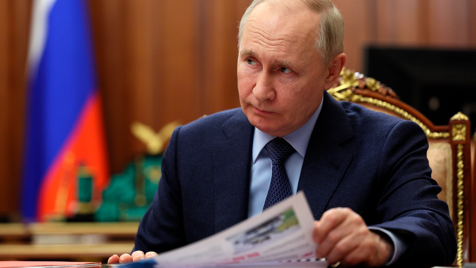 Russian President Vladimir Putin listens to Rostec State Corporation CEO Sergei Chemezov during their meeting at the Kremlin in Moscow, Russia, Thursday, Dec. 28, 2023. (Gavriil Grigorov, Sputnik, Kremlin Pool Photo via AP)