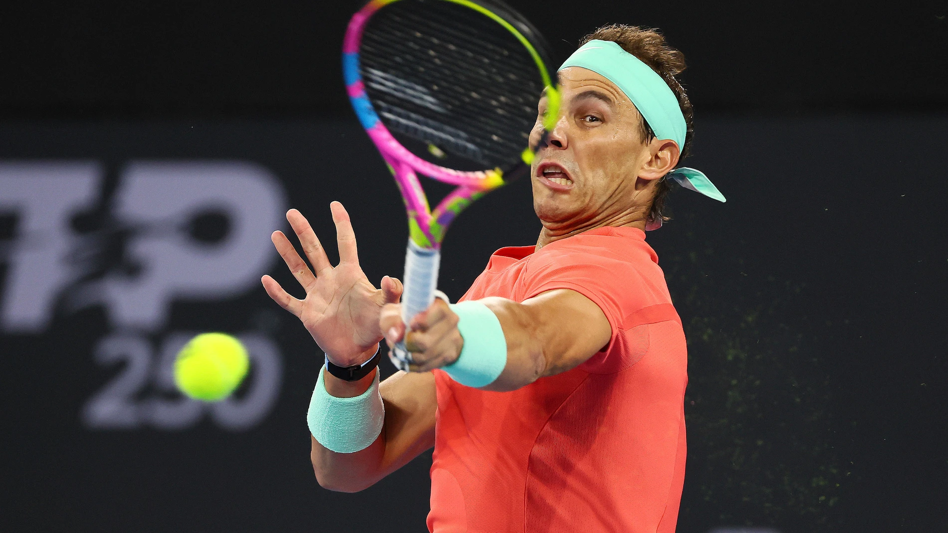 Rafael Nadal of Spain plays a shot in his match against Dominic Thiem of Austria during the Brisbane International tennis tournament in Brisbane, Australia, Tuesday, Jan. 2, 2024. (AP Photo/Tertius Pickard)