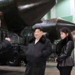 North Korean leader Kim Jong Un and his daughter Ju Ae inspecting a missile launcher production facility in an undisclosed location in North Korea. 