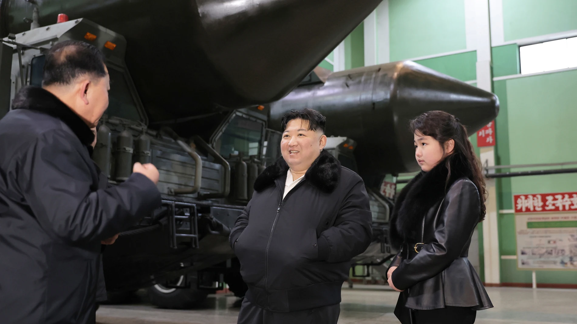Undisclosed (Korea, Democratic People''s Republic Of), 04/01/2024.- An undated photo released by the official North Korean Central News Agency (KCNA) on 05 January 2024 shows North Korean leader Kim Jong Un and his daughter Ju Ae inspecting a missile launcher production facility in an undisclosed location in North Korea. According to KCNA, Kim Jong Un calls for expanded production of 'various TELs (transporter erector launcher) for tactical and strategic weapon' for the country to be 'firmly ...