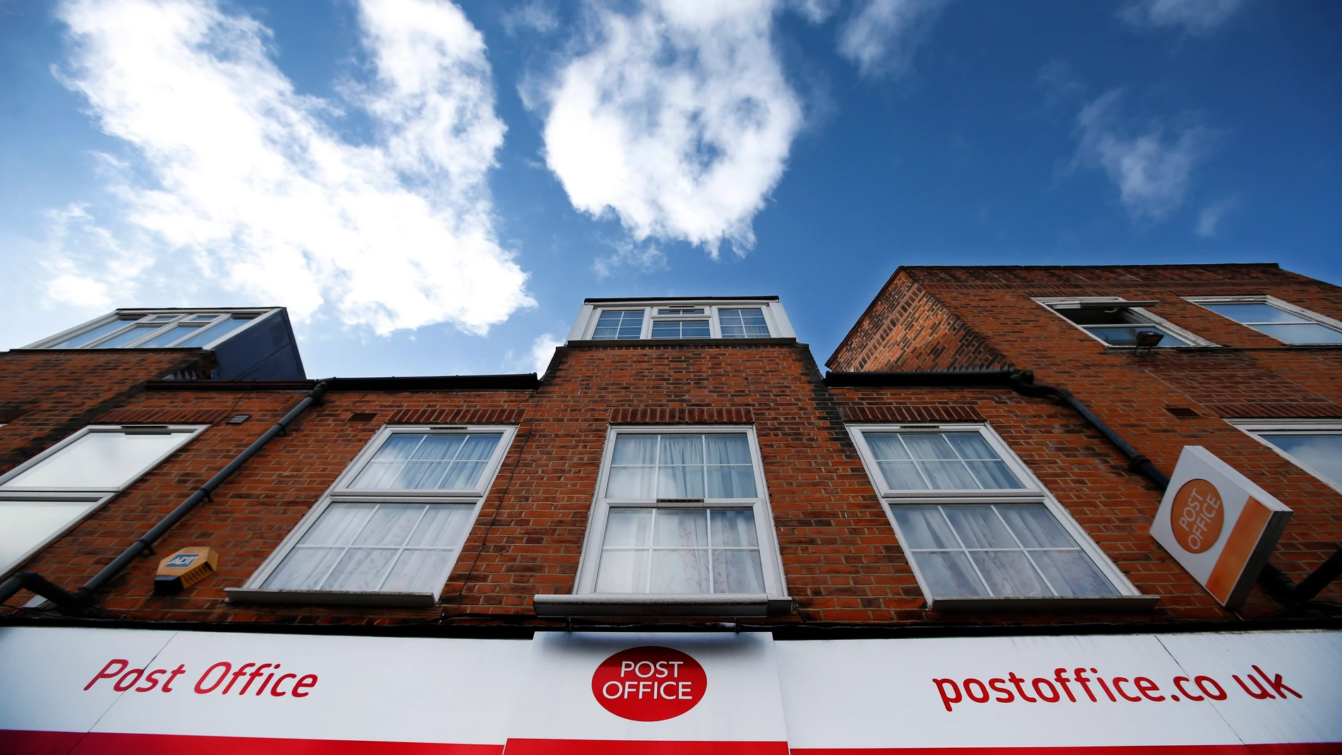 FILE - A Royal Mail Post Office is seen in London, Thursday, Oct. 10, 2013. U.K. police have opened a fraud investigation into Britain’s Post Office over a miscarriage of justice that saw hundreds of postmasters wrongfully accused of stealing money, when a faulty computer system was to blame. The Metropolitan Police said late Friday, Jan. 5, 2024, that it was investigating “potential fraud offences arising out of these prosecutions,” relating to money the Post Office received “as a result of ...