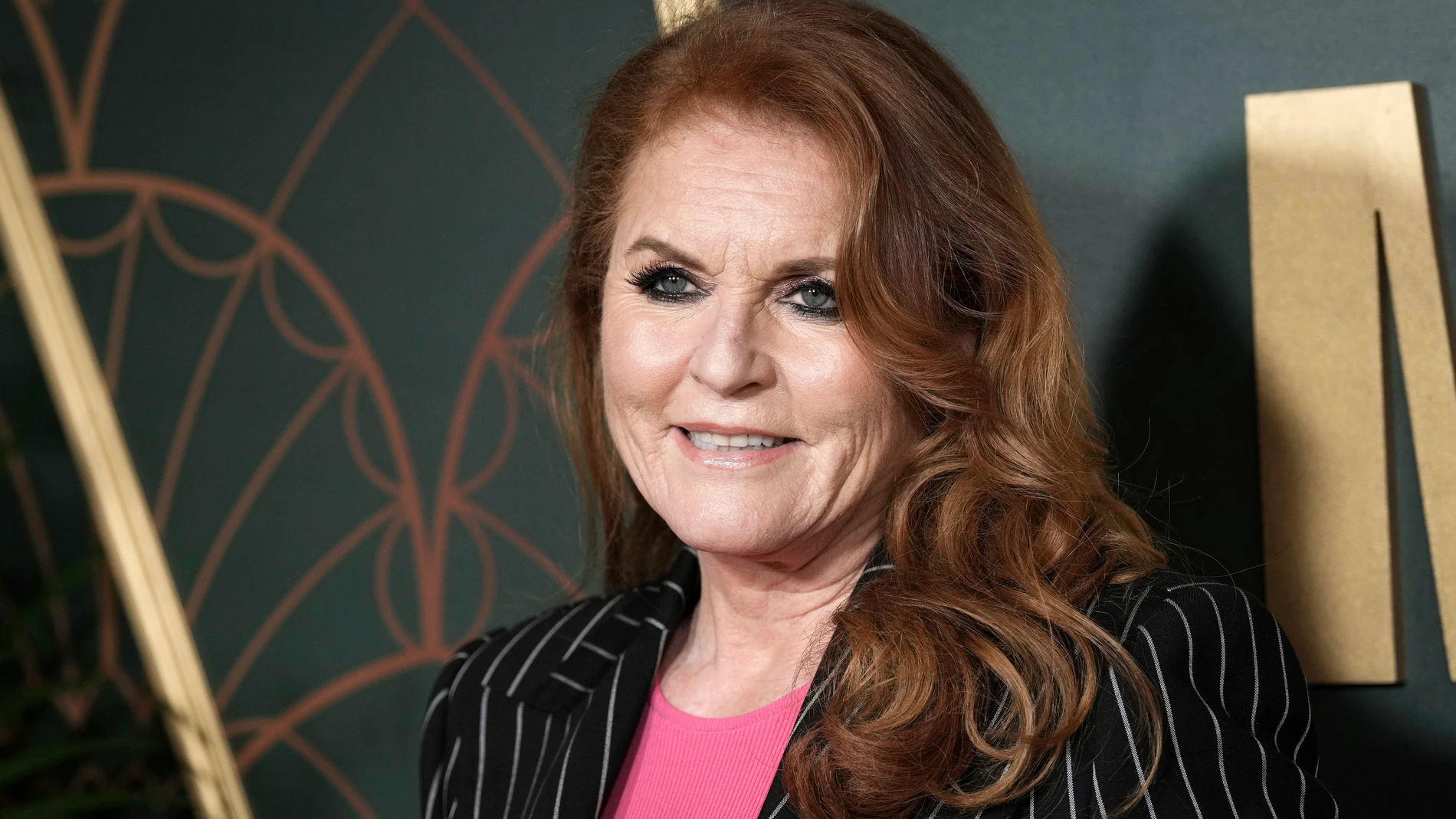 FILE - Sarah Ferguson poses for photographers upon arrival at the UK premiere of the film 'Marlowe' in London, March 16, 2023. Sarah, the Duchess of York, has been diagnosed with a malignant skin cancer that was discovered during her treatment for breast cancer, a spokesperson said. (Scott Garfitt/Invision/AP, File)
