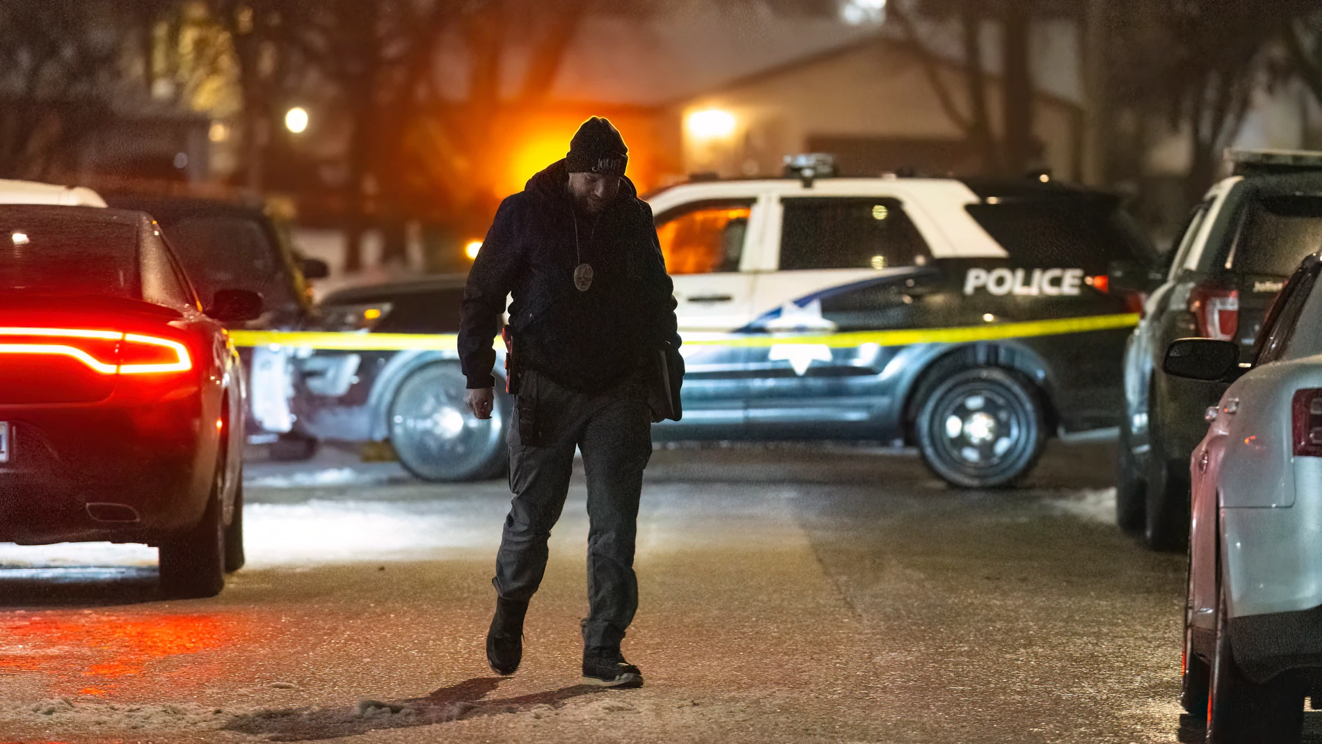 Police work a scene, Monday, Jan. 22, 2024, in Joliet, Ill., after multiple people were shot and killed over two days at three locations in the Chicago suburbs. (Tyler Pasciak LaRiviere/Chicago Sun-Times via AP)