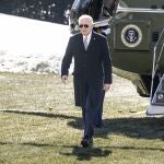 US President Joe Biden leaves Marine One as he arrives at the White House. 