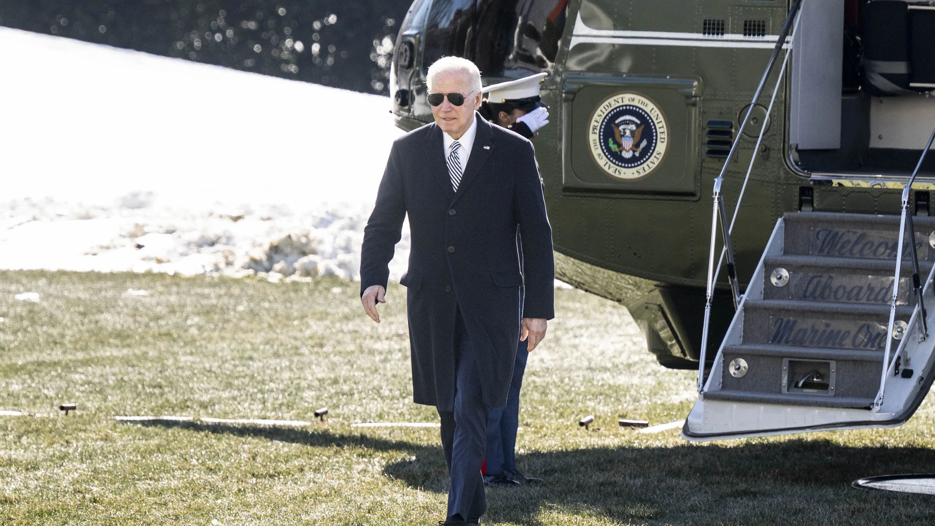 US President Joe Biden leaves Marine One as he arrives at the White House.