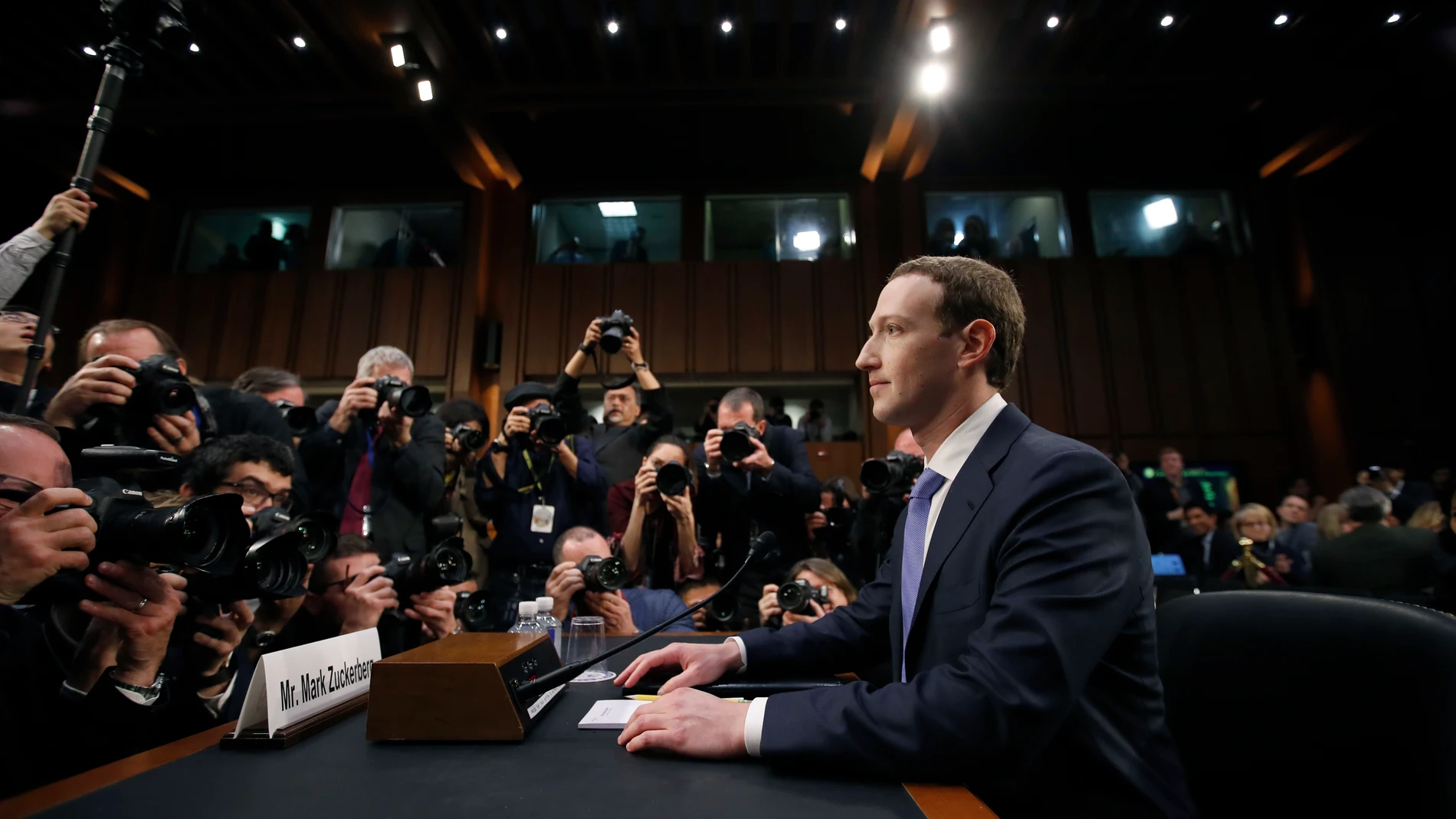 FILE - Facebook CEO Mark Zuckerberg takes his seat to testify before a joint hearing of the Commerce and Judiciary Committees on Capitol Hill in Washington, April 10, 2018, about the use of Facebook data to target American voters in the 2016 election. Zuckerberg, who was back in damage control mode on Wednesday, Jan. 31, 2024, when he apologized to the parents of children exploited, bullied or driven to self harm via social media, has accumulated a long history of public apologies, often issu...