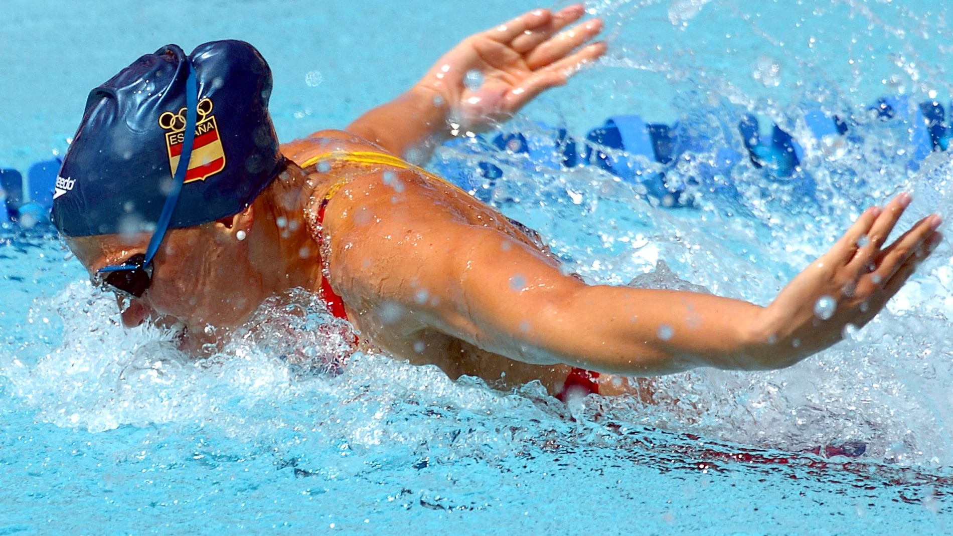 María Peláez, en el relevo de 4x100 de los Juegos de Atenas