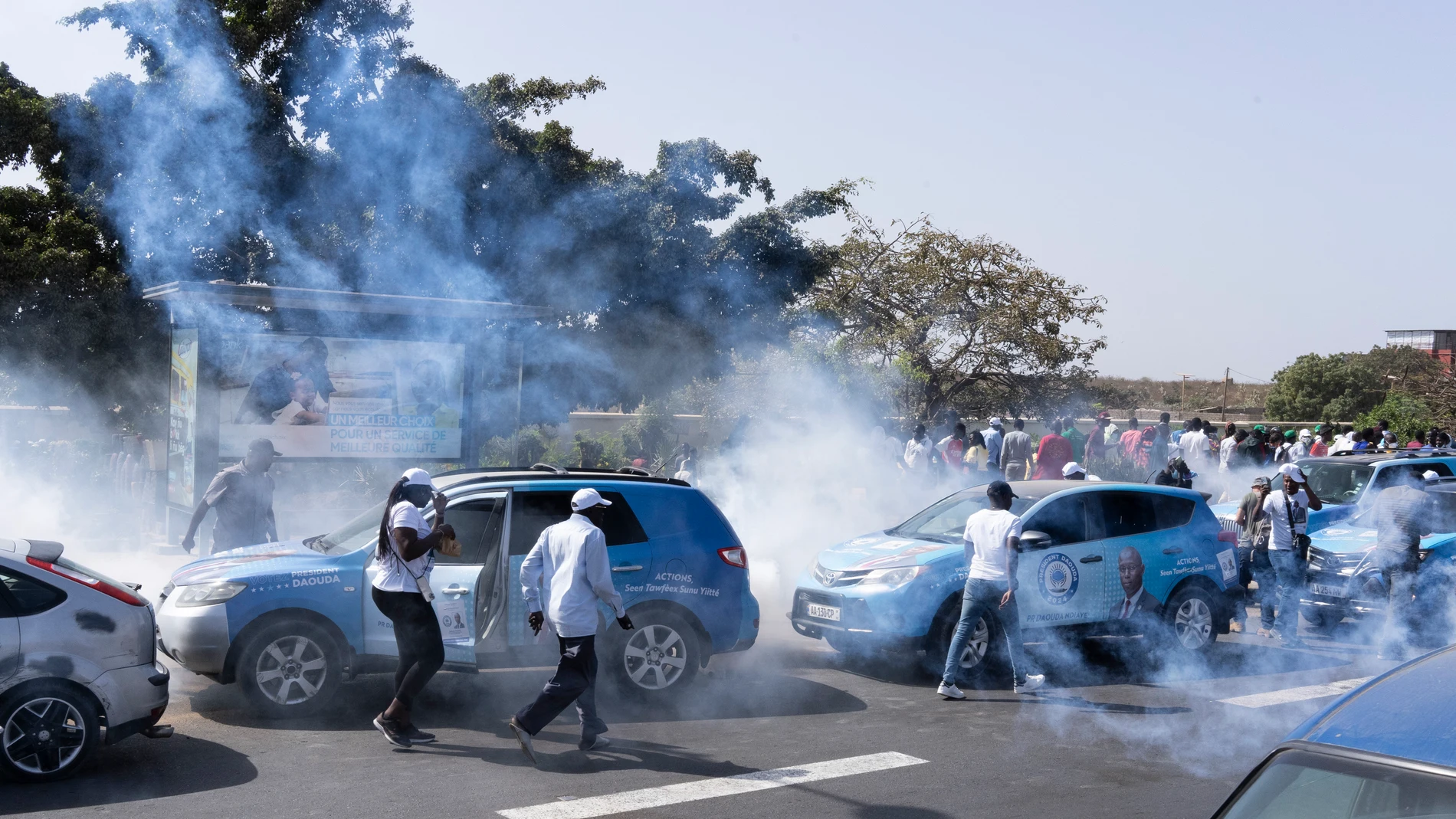 Senegalese riot police lobs tear gas at supporters of opposition presidential candidate Daouda Ndiaye, in Dakar, Senegal, Sunday, Feb. 4, 2024. West Africa's regional bloc on Sunday called for dialogue to resolve the political crisis in Senegal as opposition leaders rejected the decision by the country's leader to postpone the Feb. 25 presidential election over an electoral dispute between parliament and the judiciary. (AP Photo/Stefan Kleinowitz)