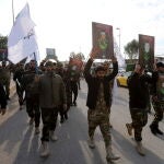 Iraqi Shiite PMF members' funeral in Baghdad after US airstrikes in western Iraq