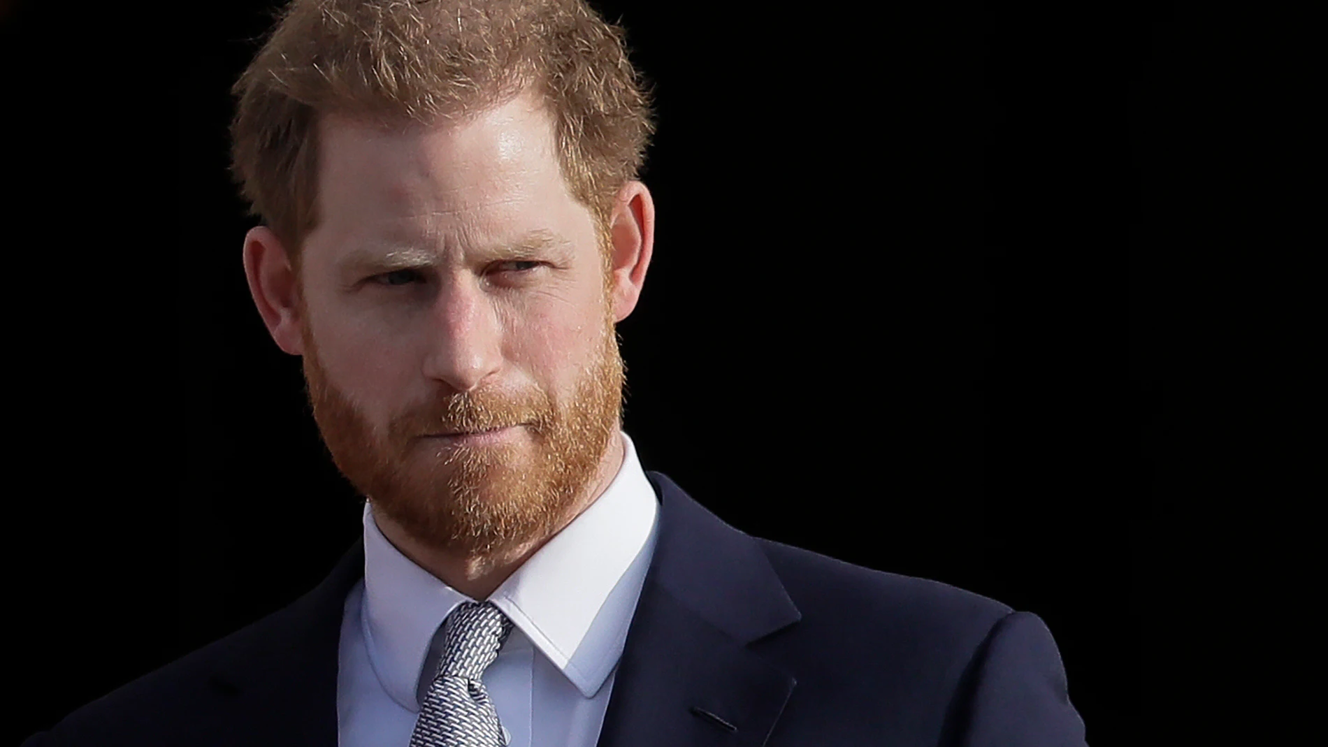 FILE - Britain's Prince Harry arrives in the gardens of Buckingham Palace in London, Jan. 16, 2020. Prince Harry has reached an out-of-court settlement with a tabloid newspaper publisher that invaded his privacy with phone hacking and other illegal snooping. Attorney David Sherborne said Friday that Mirror Group Newspapers had agreed to pay Harry’ “substantial” costs and damages and would make an interim payment of 400,000 pounds or $505,000. (AP Photo/Kirsty Wigglesworth, File)