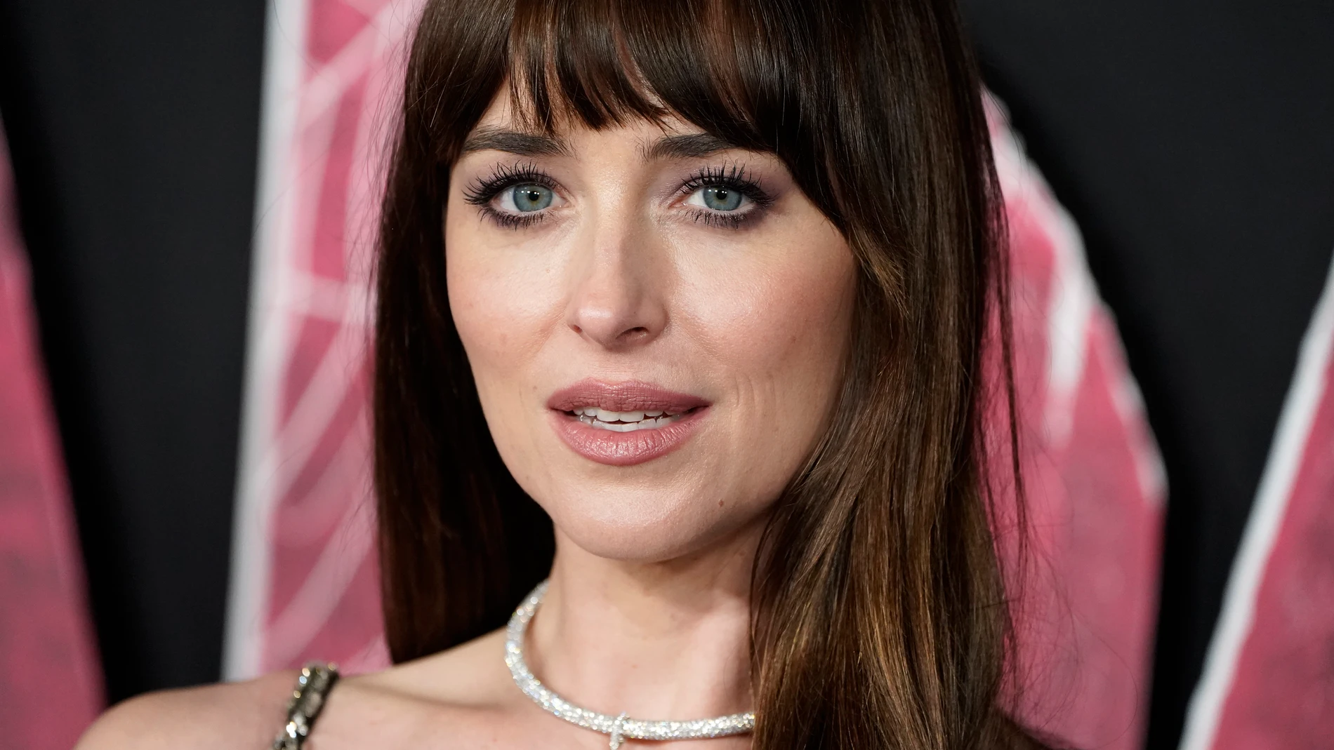 Dakota Johnson arrives at the premiere of "Madame Web," Monday, Feb. 12, 2024, at the Regency Village Theatre in Los Angeles. (Photo by Jordan Strauss/Invision/AP)