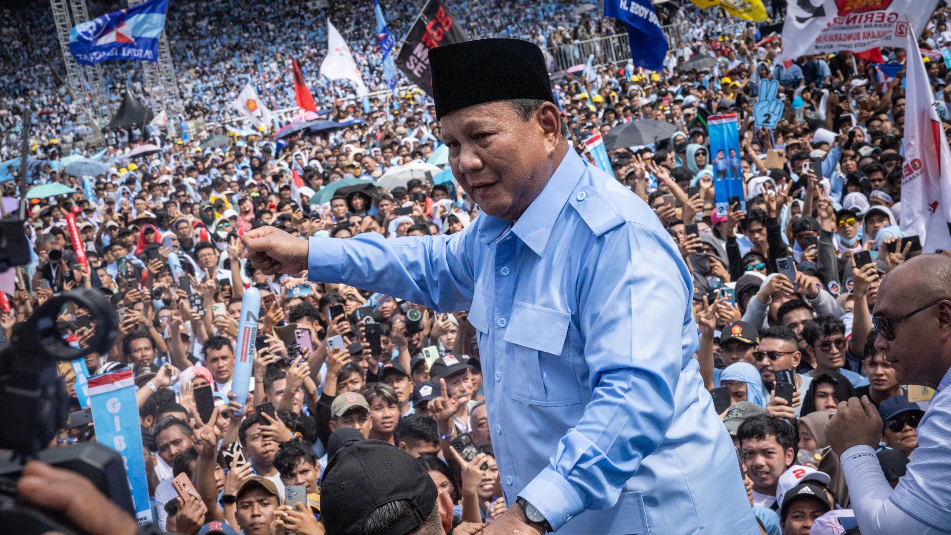 Presidential candidate and Indonesia’s Defence Minister Prabowo Subianto (C) reacts during a campaign rally at the Gelora Bung Karno Stadium in Jakarta on February 10, 2024.