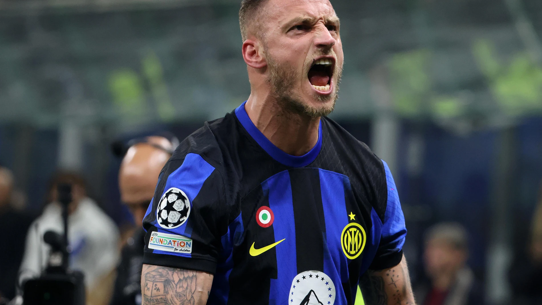 Milan (Italy), 20/02/2024.- Inter Milan'Äôs Marko Arnautovic celebrates after scoring the 1-0 during the UEFA Champions League round of 16 first leg match Inter Milan vs Atletico Madrid at Giuseppe Meazza stadium in Milan, Italy, 20 February 2024. (Liga de Campeones, Italia) EFE/EPA/MATTEO BAZZI