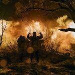 Ukrainian soldiers fire artillery at Russian positions near Bakhmut, in the Donetsk region of Ukraine, on Nov. 20, 2022. 